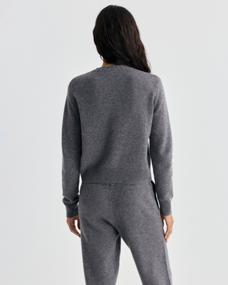 Itzel S Logo Cashmere Sweater in medium heather gray, a long-sleeved crewneck with a small chest logo.