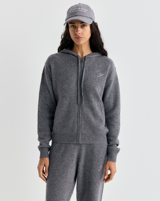 Isac S Logo Cashmere Zip Hoodie in medium heather gray with a drawstring hood and a small embroidered chest logo.