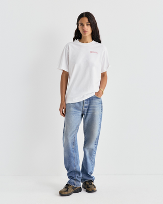 White Cameron Art Tshirt with a small red logo on the chest.
