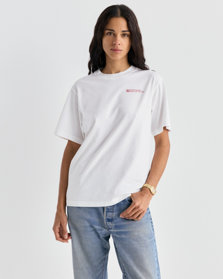 White Cameron Art Tshirt with a small red logo on the chest.