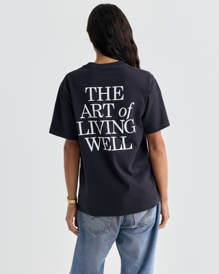 Black Cameron Art Tshirt with a small logo on the left chest that reads Good Health Starts Here.