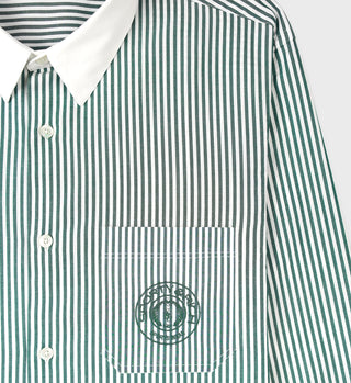 The Connecticut Crest Striped Shirt - Forest features green and white stripes, a white collar, an embroidered chest pocket logo, and is crafted in Portugal from soft cotton poplin.