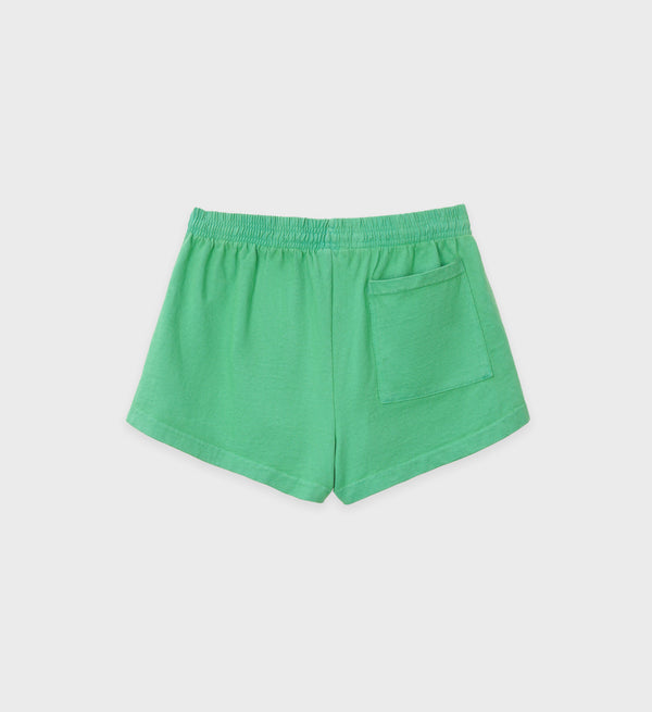 The Disco Short - Kelly is a green heavy jersey short with an elastic waistband and a single back pocket, made in Los Angeles and shown on a plain background.