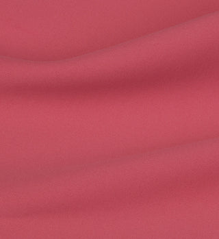 Close-up of the smooth, pink Legging N.03 - Hibiscus fabric, featuring soft folds and a gentle, luxurious texture.