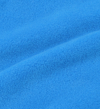 Close-up of soft, bright blue fleece with visible texture and gentle folds—perfect for cozy winter wear like the Hooded Polar Sweatshirt - Ocean.