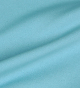 Close-up of the Stone Blue Sports Bra N.03 fabric, featuring soft folds and a smooth texture for ideal support and comfort.