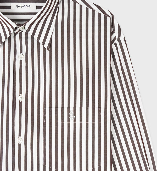 The SRC Oversized Shirt - Chocolate Striped is a brown and white vertical striped cotton poplin button-up with a chest pocket and collar, made in Portugal.