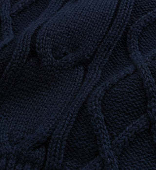 Close-up of the SRC Cableknit Vest in Navy/White, crafted from 100% cotton with a textured cable knit pattern. Made in Portugal.