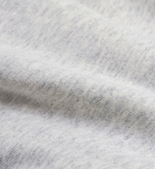 Close-up of the heather gray fabric with soft texture and subtle folds, featured on our Track Club Crewneck.
